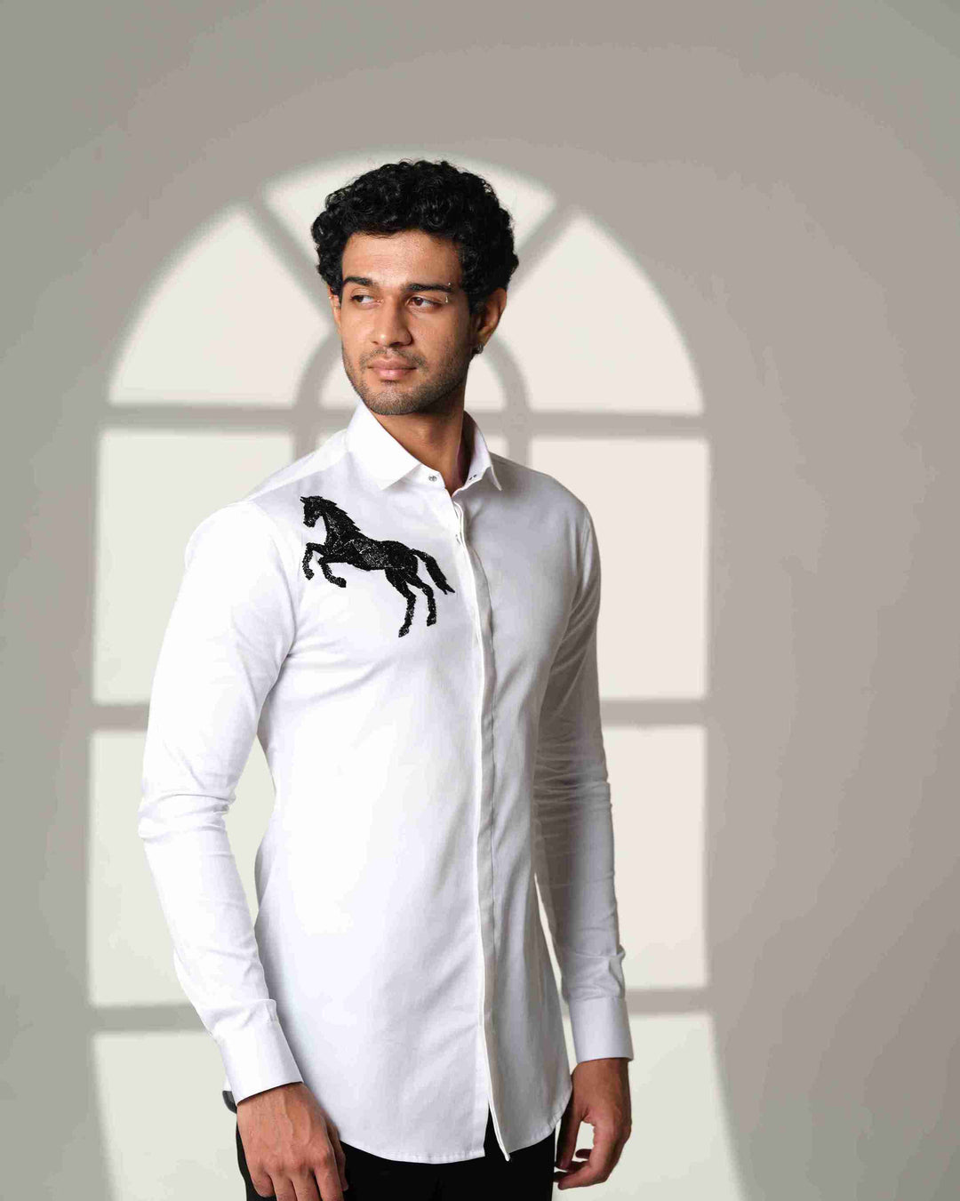White Shirt with Black Horse on Right shoulder