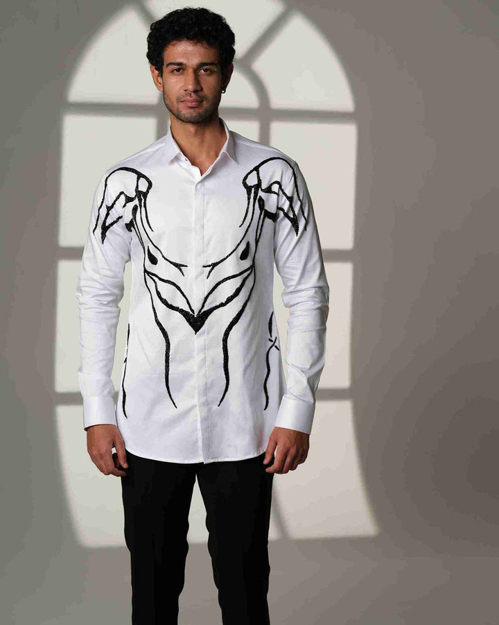 Ivory Armor – White Shirt with Hand-Embroidered Abstract Crest