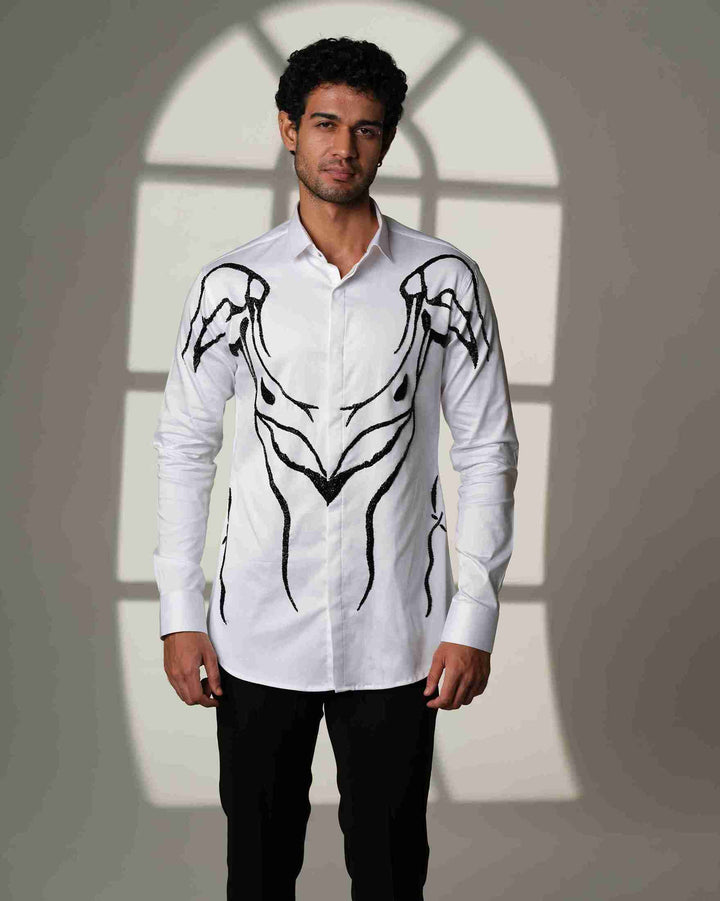Ivory Armor – White Shirt with Hand-Embroidered Abstract Crest