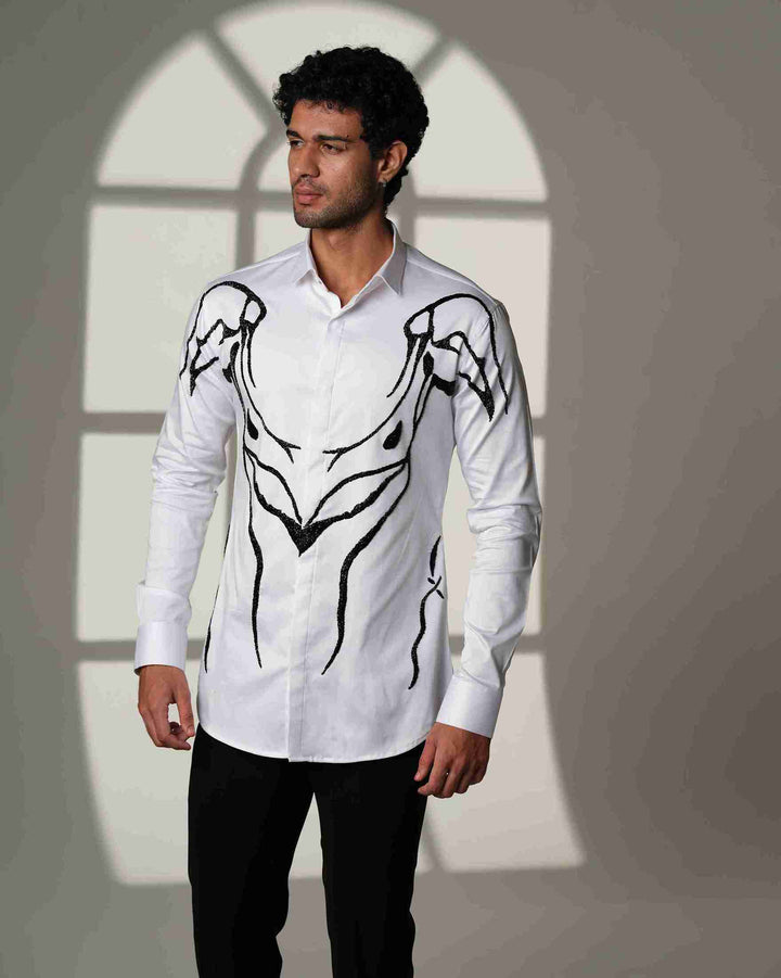 Ivory Armor – White Shirt with Hand-Embroidered Abstract Crest