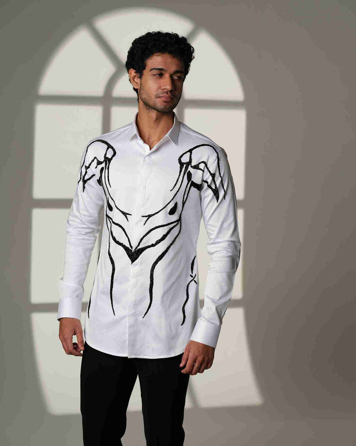 Ivory Armor – White Shirt with Hand-Embroidered Abstract Crest
