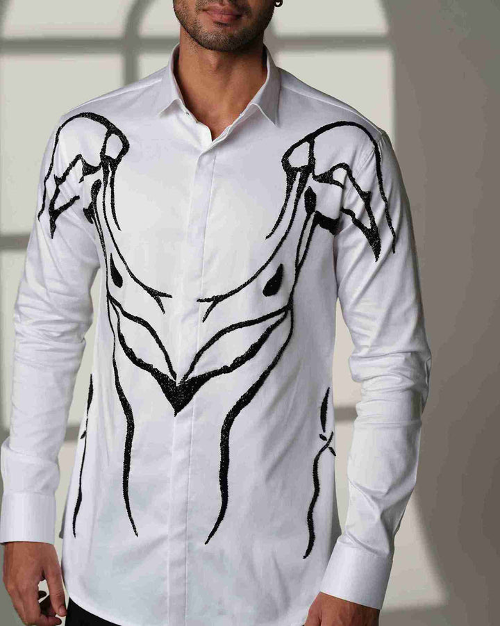 Ivory Armor – White Shirt with Hand-Embroidered Abstract Crest
